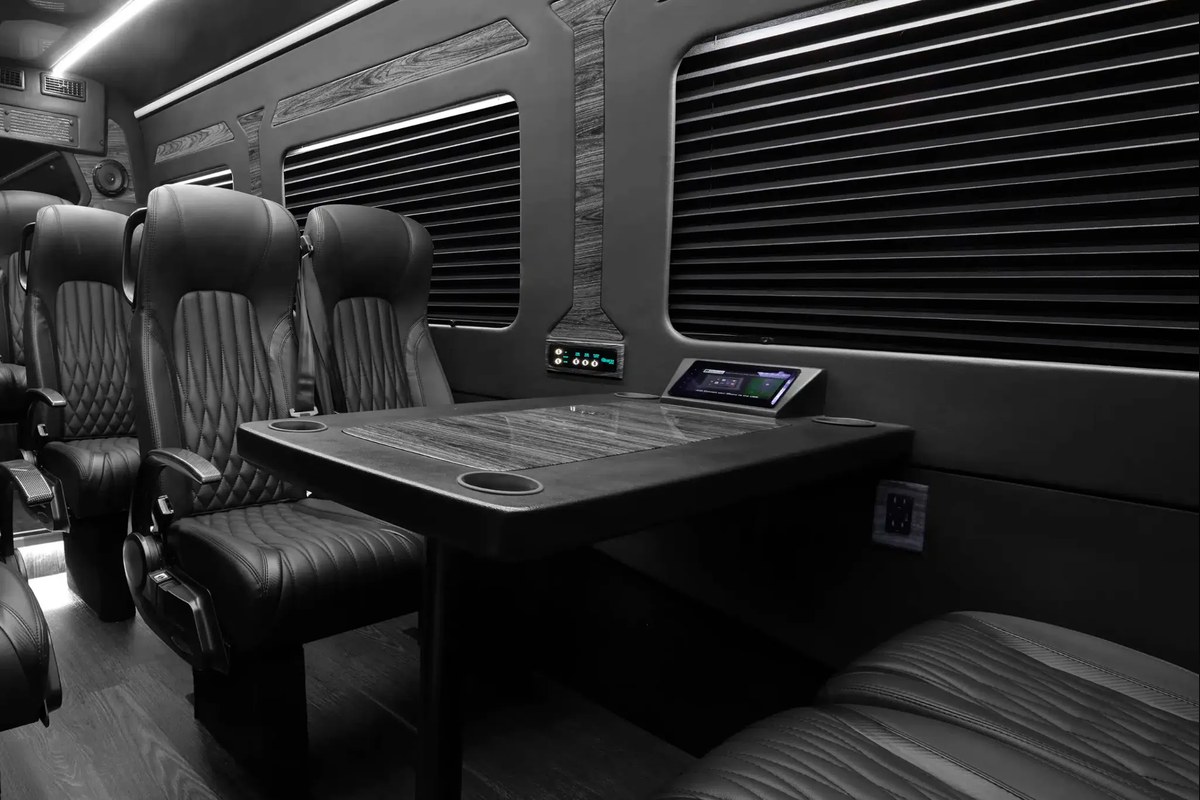 Executive luxury Sprinter van interior with conference table for San Francisco chauffeur service